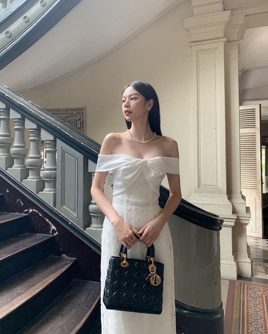 Soi áo dài mùng 2 Tết của mỹ nhân Việt: nhiều nàng chọn thiết kế của local brand ''quen mặt'', giá cả đi đôi với chất lượng  - Ảnh 5.