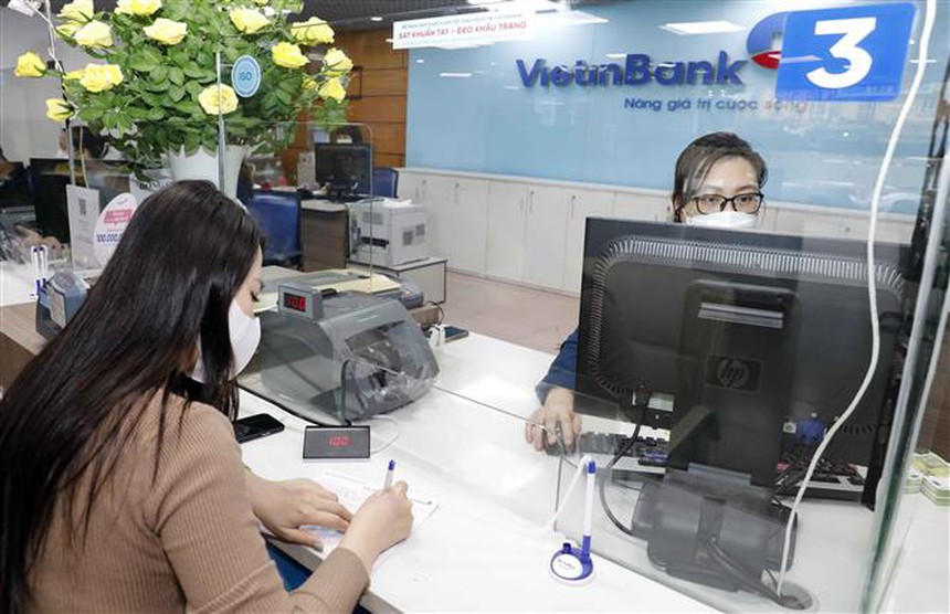 Ngân hàng tung "lì xì" hấp dẫn, hút tiền gửi sau Tết - Ảnh 1. Ngân hàng tung "lì xì" hấp dẫn, hút tiền gửi sau Tết - Ảnh 1.