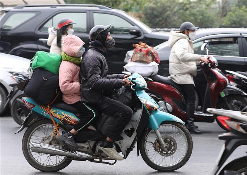 Người dân trở lại Hà Nội sau kỳ nghỉ Tết nguyên đán - Ảnh 9.