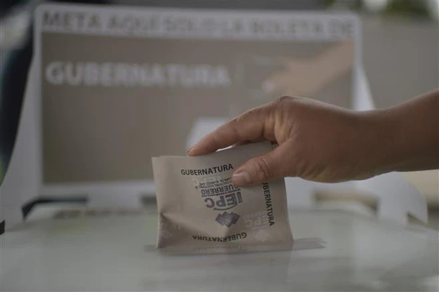 DỰ BÁO THẾ GIỚI 2024: Năm kỷ lục về bầu cử - Cảnh báo nguy cơ thông tin sai lệch 'nở rộ' do AI - Ảnh 1.