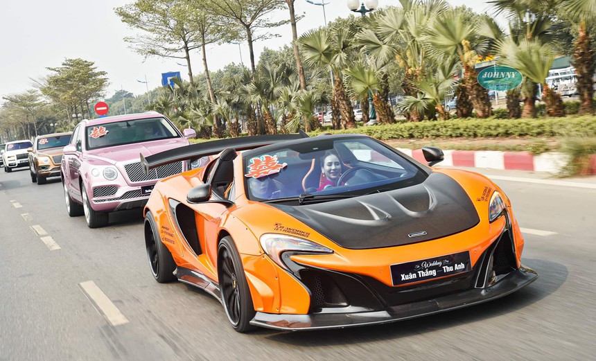 Đám cưới siêu xe ở Hà Nội quy tụ cặp Rolls-Royce, Bentley: Hé lộ gia thế khủng của "đàng trai" - Ảnh 4. Đám cưới siêu xe ở Hà Nội quy tụ cặp Rolls-Royce, Bentley: Hé lộ gia thế khủng của "đàng trai" - Ảnh 4.