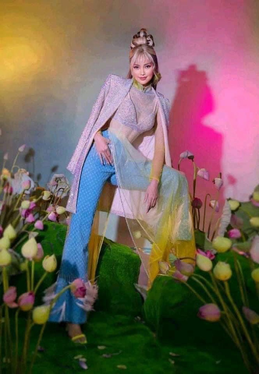 Ngọc Châu nhận 'bão' chỉ trích khi diện áo dài xuyên thấu phản cảm, phía Hoa hậu và NTK nói gì? - Ảnh 2. Ngọc Châu nhận 'bão' chỉ trích khi diện áo dài xuyên thấu phản cảm, phía Hoa hậu và NTK nói gì? - Ảnh 2.