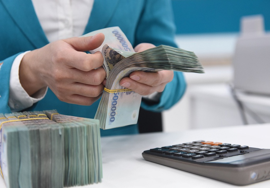 Lãi suất nhiều ngân hàng đồng loạt giảm từ ngày hôm nay 4/3 - Ảnh 1. Lãi suất nhiều ngân hàng đồng loạt giảm từ ngày hôm nay 4/3 - Ảnh 1.