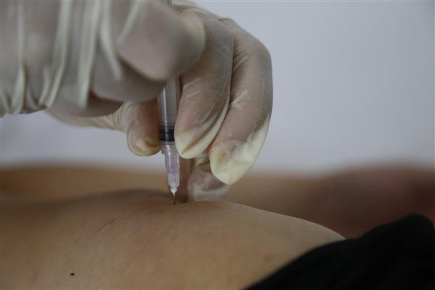 Chuẩn bị cho việc công bố hết dịch COVID-19 nhưng vẫn không được phép chủ quan - Ảnh 3.