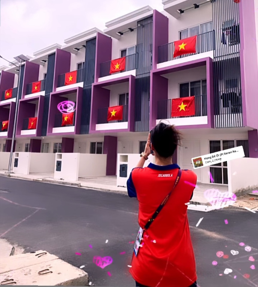 Thúy Vi xúc động ghi lại hình ảnh cờ Việt Nam nhuộm đỏ làng VĐV SEA Games 32 - Ảnh 2.