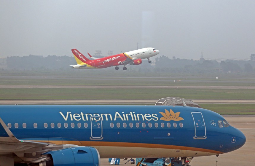 Lý do Bộ Giao thông Vận tải chưa bỏ trần giá vé máy bay - Ảnh 1.