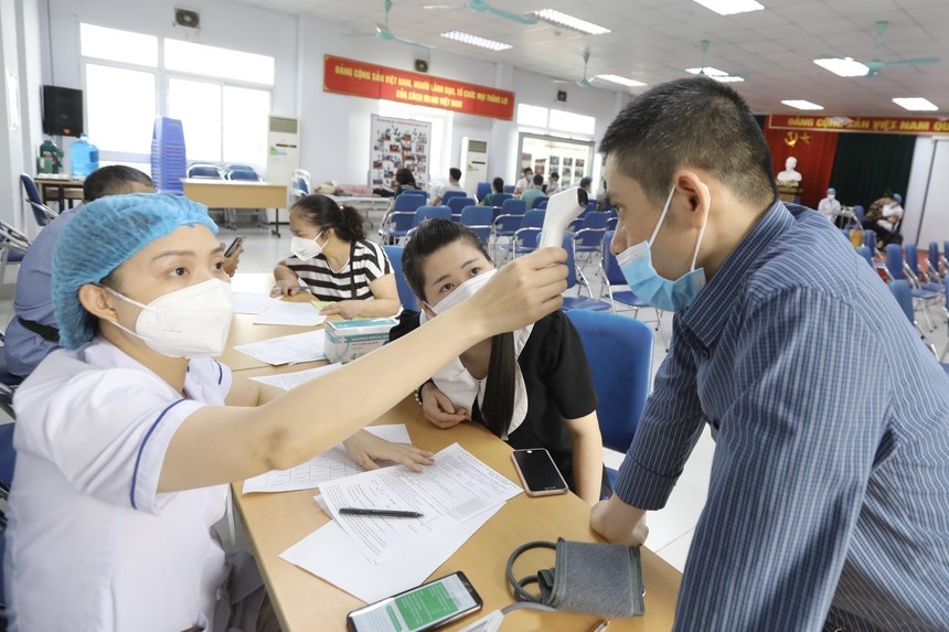 Bộ Y tế đề xuất công bố hết dịch Covid-19 thuộc nhóm A - Ảnh 1.