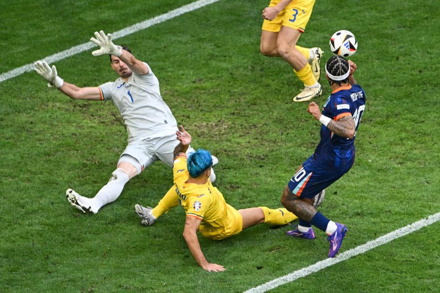 Gakpo - Malen rực sáng, 'Cơn lốc màu da cam' cuốn phăng Romania để tiến vào tứ kết - Ảnh 9.