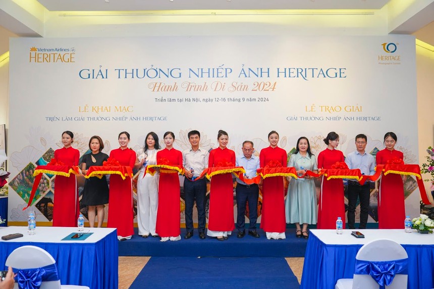 'Những bức ảnh trao gửi yêu thương' hướng tới đồng bào vùng lũ - Ảnh 1. 'Những bức ảnh trao gửi yêu thương' hướng tới đồng bào vùng lũ - Ảnh 1.