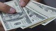 Đồng USD tăng giá sau hai tuần giảm liên tiếp