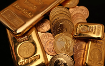Giá vàng thế giới giảm nhẹ do đà tăng của giá dầu và đồng USD