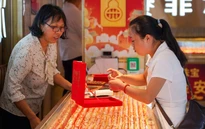 Giá vàng lao dốc sau khi Fed phát tín hiệu cứng rắn