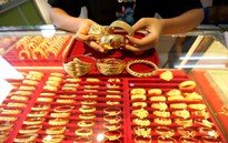 Giá vàng tăng mạnh nhất trong hai tuần khi đồng USD giảm