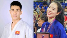 Lê Thanh Thúy và Lê Minh Thuận cầm cờ cho Đoàn Thể thao Việt Nam tại SEA Games 33