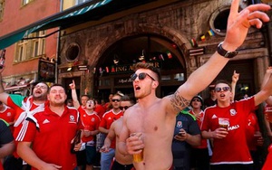 Cổ động viên Bồ - xứ Wales trái ngược cảm xúc