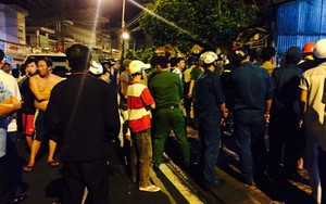 Dập tắt vụ cháy nhà ở phố Lê Duẩn, Hà Nội