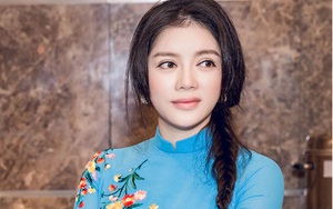 Diện áo dài, Lý Nhã Kỹ tiếp kiến Tổng thống Pháp