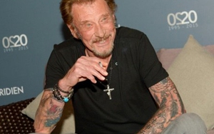 Ngôi sao rock Pháp nhận hai con nuôi Việt đang phải điều trị ung thư