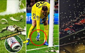 CĐV AC Milan mặc áo số 71, tạo ra cơn 'mưa' tiền giả xuống khung thành của Donnarumma
