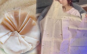 Thưởng thức món ăn vặt tuổi thơ nức tiếng một thời, cô gái lại bị dân tình tưởng nhầm là ăn… giấy 