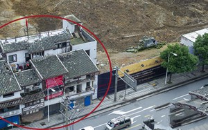 Ngôi nhà 80m2 siêu "cứng đầu" ở Trung Quốc: Gia chủ nghỉ việc, lắp hẳn 18 camera, nuôi 4 con chó để theo dõi, chỉ rời đi khi được bồi thường thỏa đáng