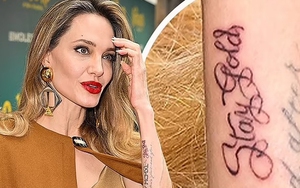 Angelina Jolie xuất hiện tươi tắn với hình xăm mới cùng Pax Thiên