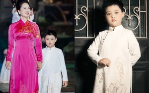 NSND Lan Hương dắt tay mẫu nhí Nguyễn Hoàng Long trên sân khấu Lễ hội Sen Hà Nội