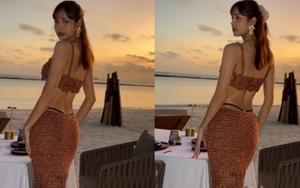 Chiếc váy "táo bạo" tôn lên vóc dáng đồng hồ cát của Lisa Blackpink đang gây sốt