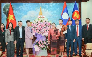 Tổng Giám đốc TTXVN chúc mừng 50 năm Quốc khánh nước Cộng hoà Dân chủ Nhân dân Lào