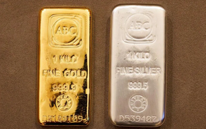 Giá bạc thế giới lần đầu tiên vượt mốc 66 USD/ounce trong khi giá vàng tăng nhẹ