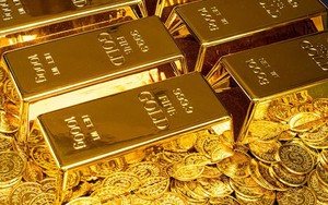 Giá vàng giảm khi tình hình thương mại lạc quan hơn