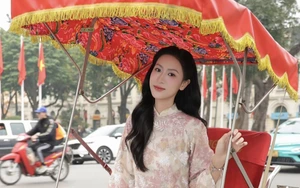 Hai 'bóng hồng' của bóng chuyền Việt Nam khoe sắc trong tà áo dài Tết