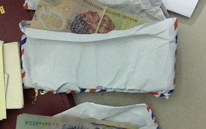 Nhận tiền trái luật, hai người tự xưng phóng viên bị công an tạm giữ