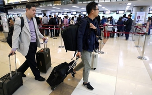 Các phóng viên Hàn Quốc đáp chuyến bay từ Seoul tới Triều Tiên