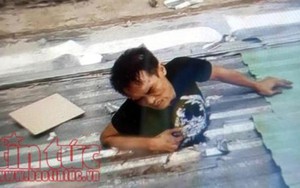 Sự thật bức ảnh 'tên ăn trộm đục mái tôn dính phải đường điện chết tại chỗ'