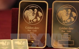 Giá vàng châu Á vẫn quanh mức thấp trong vòng hai tuần