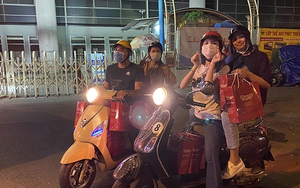 Tiểu Vy cùng 'bà trùm' hoa hậu xuyên đêm phát quà cho người vô gia cư