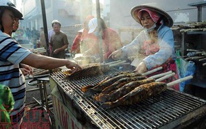 VIDEO: Cá lóc nướng đắt hàng ngày vía Thần Tài