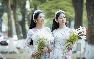 Ngọc Hân - Mỹ Linh ‘đọ sắc’ trong áo dài họa tiết hoa loa kèn