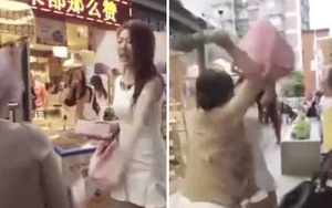 VIDEO: 'Đại chiến' bà già với hot girl không xếp hàng rồi mang tiền ra dọa