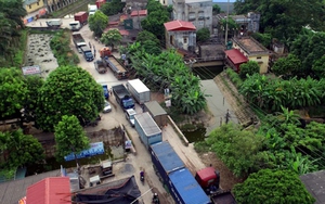 Choáng với cảnh xe tải, container 'chui' vào khu dân cư né trạm thu phí BOT Quốc lộ 5