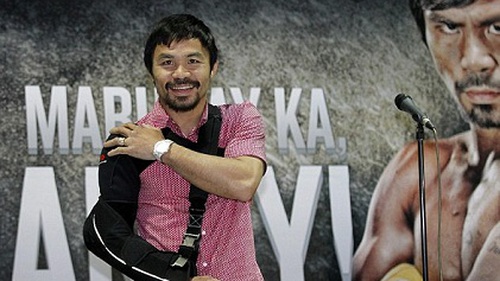 Pacquiao trở về Manila với cánh tay bó bột