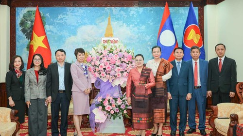 Tổng Giám đốc TTXVN chúc mừng 50 năm Quốc khánh nước Cộng hoà Dân chủ Nhân dân Lào