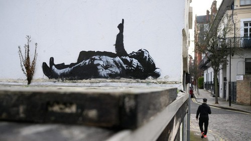 Bức tranh tường kỳ lạ của Banksy "sưởi ấm" mùa Giáng sinh
