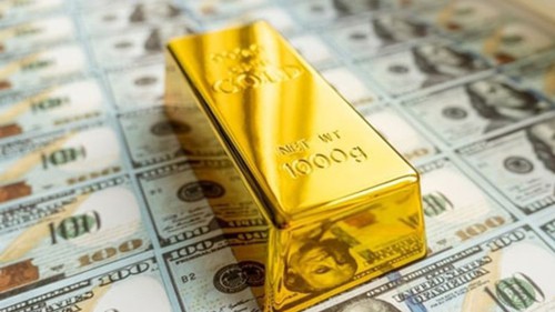 Đồng USD mạnh lên, giá vàng rời khỏi mức cao kỷ lục