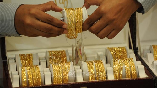 Đồng USD mạnh tác động lên thị trường vàng châu Á phiên 19/9