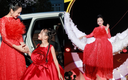Angela Phương Trinh lần đầu xuất hiện cùng con gái nuôi, gây thót tim với màn đu cần cẩu xuống thảm đỏ