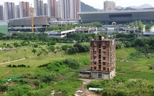 Tòa nhà 7 tầng 1000m2 nằm trên 'vùng đất vàng' không chịu di dời khiến dự án bị lùi đến 7 năm: Từ chối 20 triệu NDT tiền đền bù, chỉ rời đi khi nhận được khoản tiền gấp 6 lần
