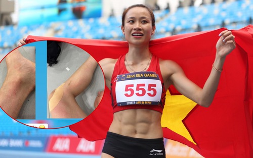 Hotgirl 6 múi điền kinh để lộ đôi chân trầy xước sau khi giành vượt rào giành HCV