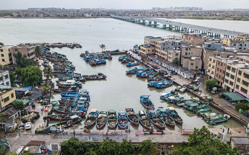 Trung Quốc kích hoạt hệ thống ứng phó khẩn cấp với lũ lụt và bão